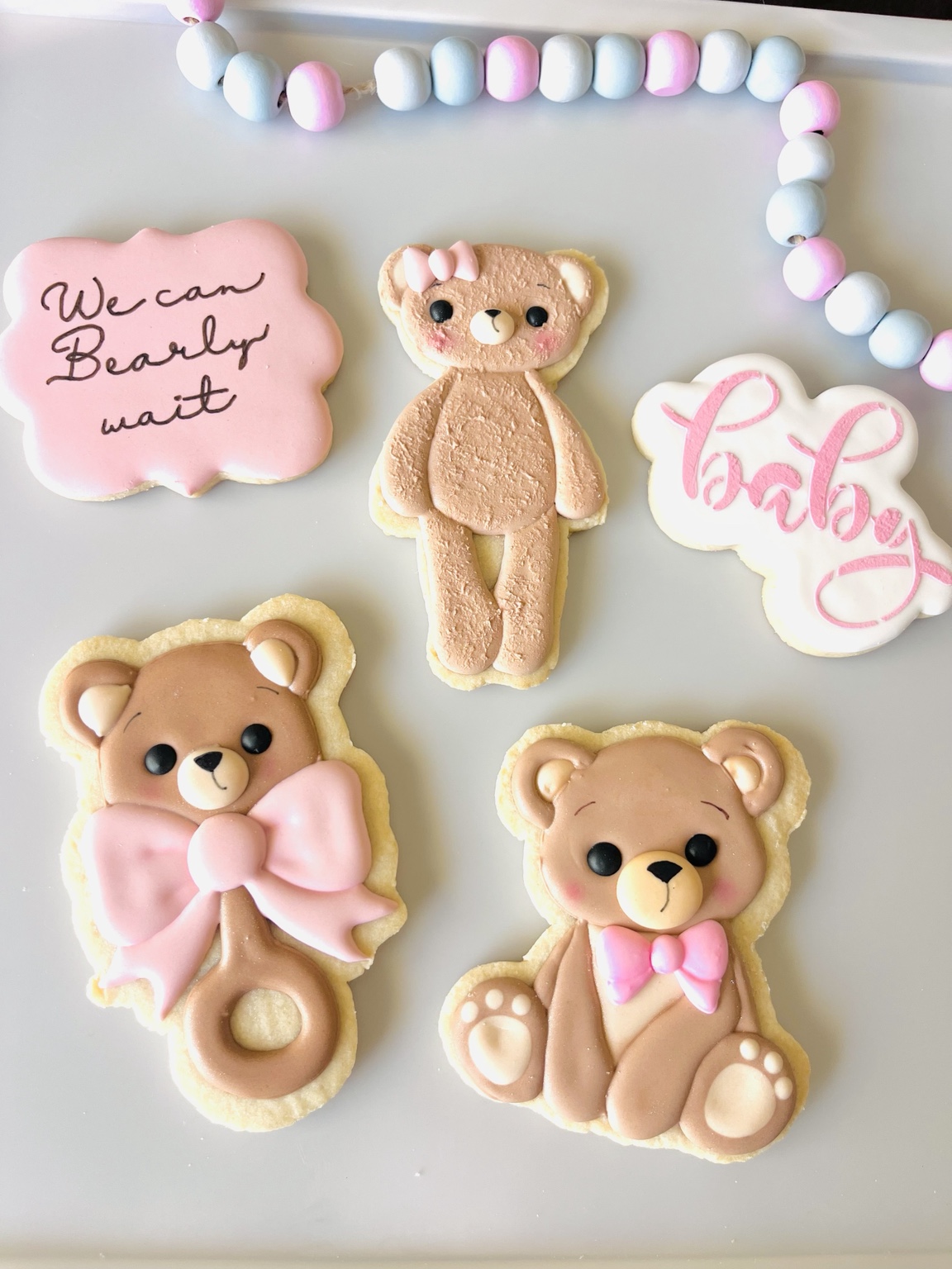 Pink baby bear and baby announcement cookies