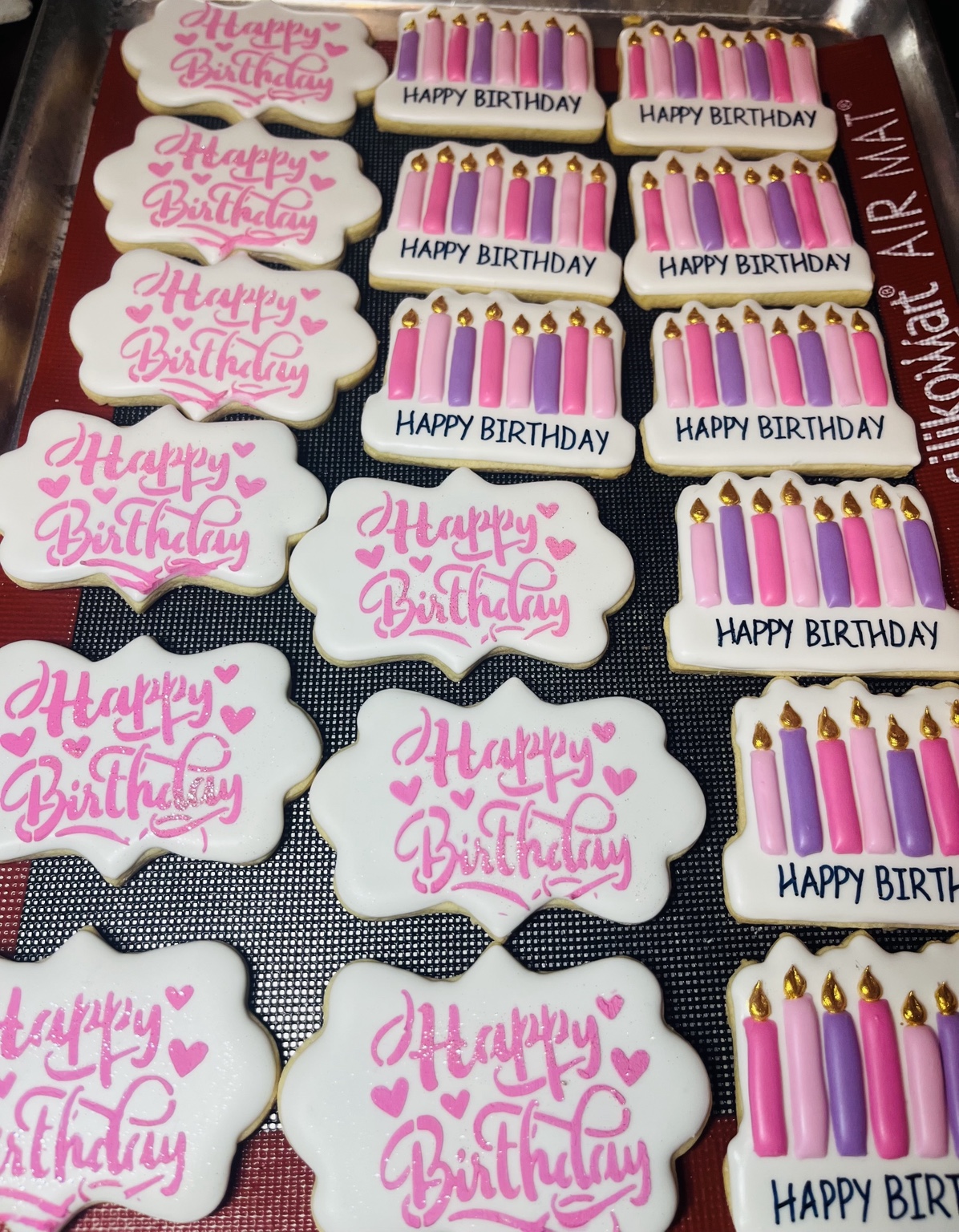 Pink and purple happy birthday candle cookies