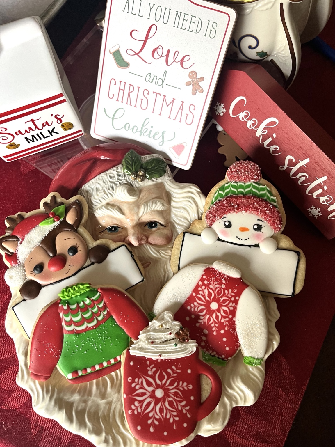 Santa, reindeer, snowman, sweater, and mug cookies