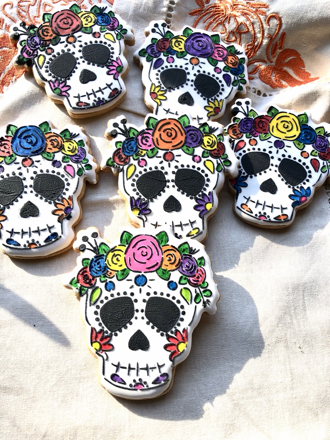 Colorful Día de los Muertos sugar skull cookies