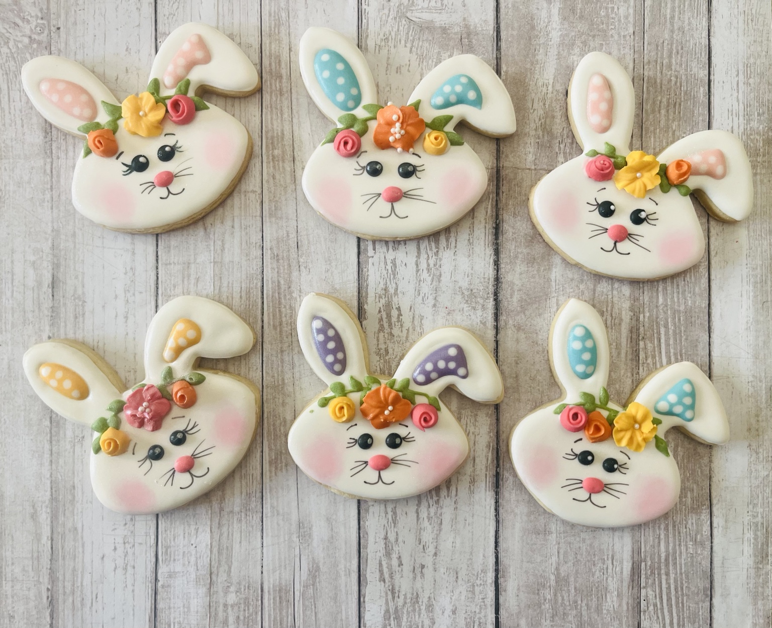 White Easter bunny face cookies with floral crowns